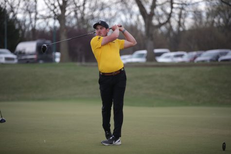 Iowas Mac McClear takes a swing during the Hawkeye invitational at Finkbine Golf Course in Iowa City on Saturday, April 15, 2023. The Hawkeyes lead after all three rounds of the two-day tournament, and took both the team and individual sweepstakes with Iowas Mac McClear taking the individual title.