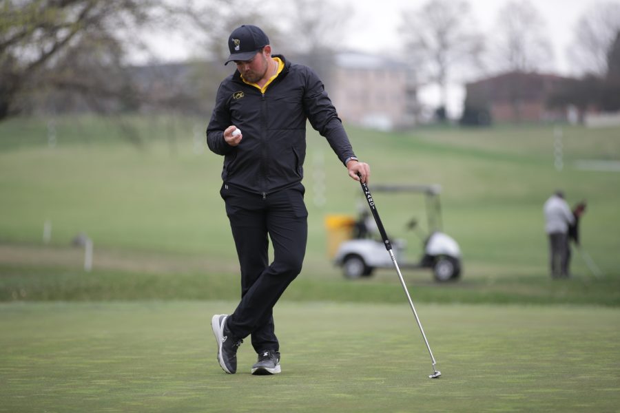 Iowas Mac McClear waits to putt during the Hawkeye invitational at Finkbine Golf Course in Iowa City on Saturday, April 15, 2023. The Hawkeyes lead after all three rounds of the two-day tournament and took both the team and individual sweepstakes with Iowas Mac McClear taking the individual title.