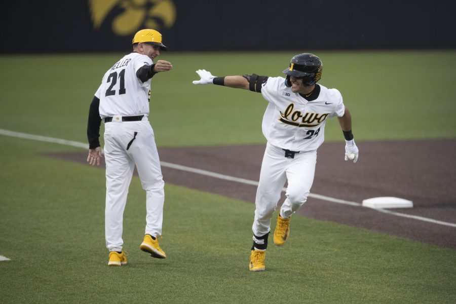 Iowa+first+basemen+Brennen+Dorighi+high-fives+head+coach+Rick+Heller+after+hitting+a+home+run+during+a+baseball+game+between+Iowa+and+Bradley+at+Duane+Banks+Field+on+Wednesday%2C+April+19%2C+2023.The+Iowa+Hawkeyes+defeated+the+Bradley+Braves%2C+6-1.+Dorighi+recorded+two+hits+in+five+at-bats.