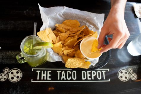 A basket with chips and queso paired with a margarita is seen at Taco Depot III in Cedar Rapids on Monday, April 20, 2023.