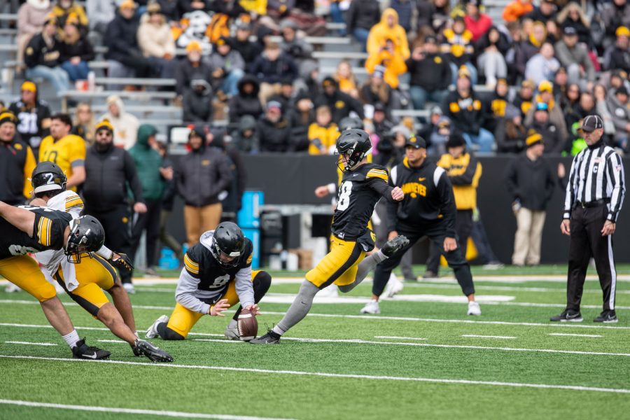 Iowa kicker Drew Stevens prepares to kick a field goal during a spring football practice at the Kinnick Stadium on Saturday, April 22, 2023.