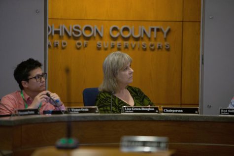 Chairperson Lisa Green-Douglass and supervisor V Fixmer-Oraiz listen to a presentation during the Johnson County Board of Supervisors meeting in the Johnson County Administration Building on Wednesday, April 26, 2023.