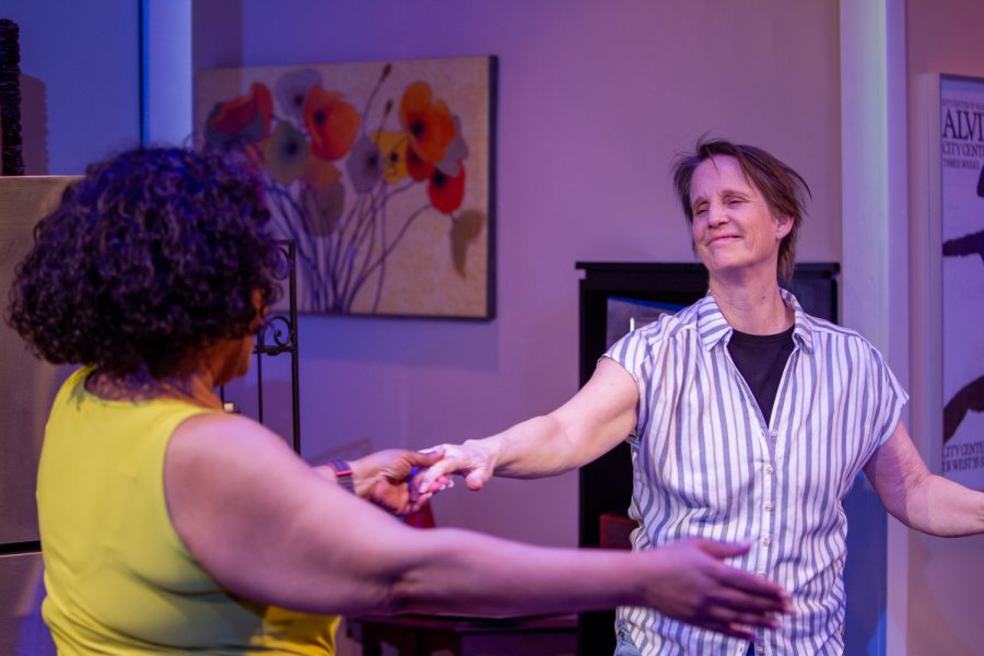 Mary Mayo, playing Robyn, and Joy Vandervort-Cobb playing Sharon, perform during a production of “The Roommate” presented by the Riverside Theatre in Iowa City on Thursday, April 28, 2023.