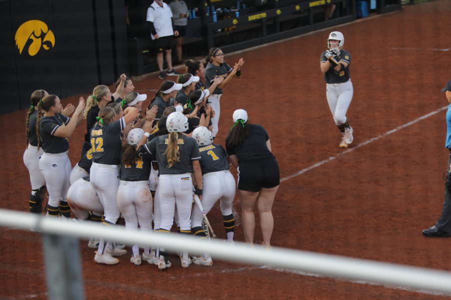 Iowa+players+cheer+for+Denali+Locker+as+she+runs+home+after+hitting+a+home+run+during+a+softball+game+between+Iowa+and+Rutgers+at++Bob+Pearl+Softball+Field+in+Iowa+City+on+Friday%2C+April+28%2C+2023.+The+Scarlet+Knights+defeated+the+Hawkeyes%2C+5-3.