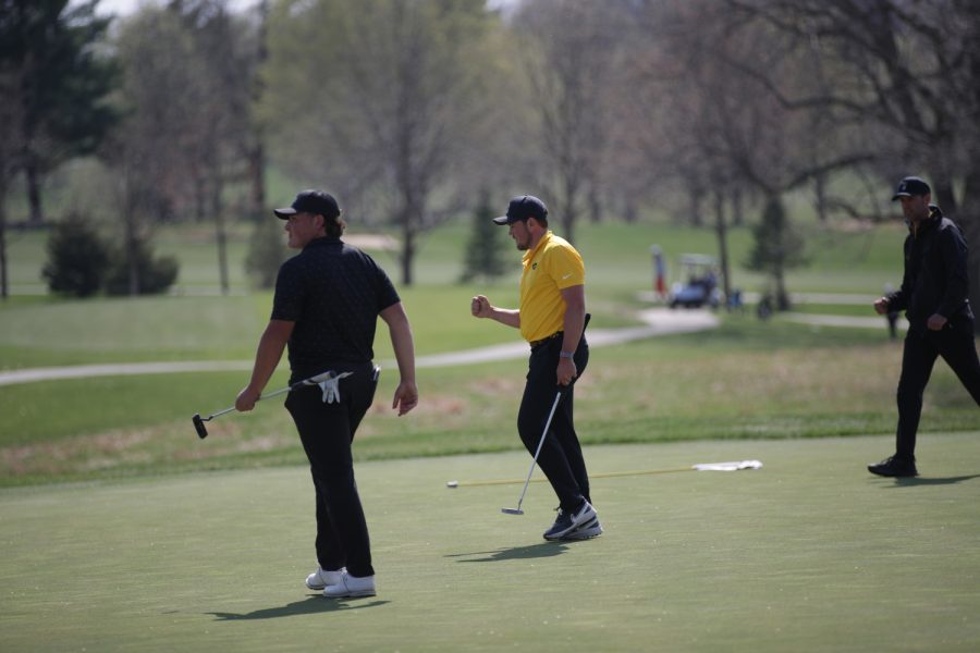 Iowas Mac McClear celebrates after a made putt during the Hawkeye Invitational at Finkbine Golf Course in Iowa City on Saturday, April 15, 2023. The Hawkeyes led after all three rounds of the two-day tournament and took both the team and individual sweepstakes with Iowas Mac McClear taking the individual title. 