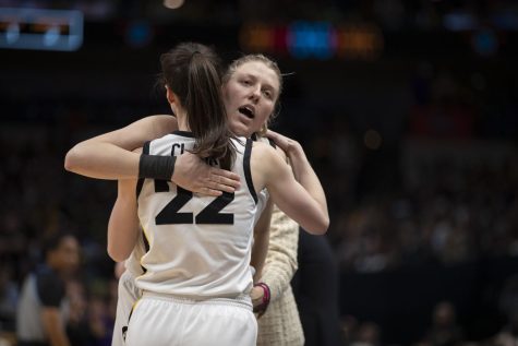 Iowa guard Caitlin Clark hugs center Monika Czinano during the NCAA Tournament national championship game against LSU on Sunday, April 2, 2023. The Hawkeyes lost to the Tigers, 102-85.