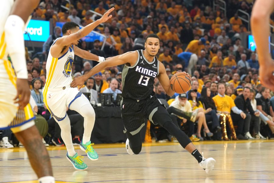 Apr 23, 2023; San Francisco, California, USA; Sacramento Kings forward Keegan Murray (13) dribbles against Golden State Warriors guard Jordan Poole (left) during the first quarter of game four of the 2023 NBA playoffs at Chase Center. 