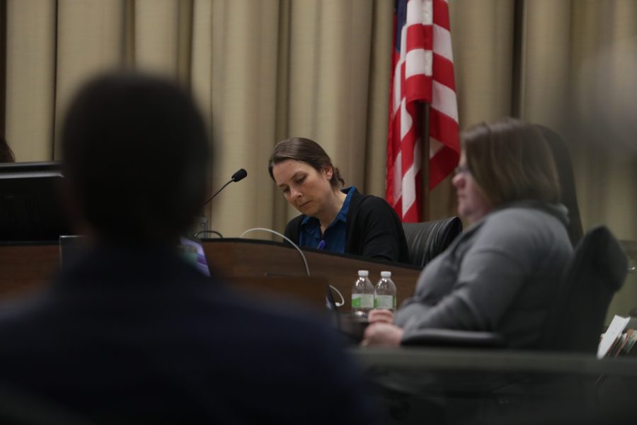 Iowa City councilmember Laura Bergus looks down during a meeting in Iowa City on Tuesday, March 7, 2023.