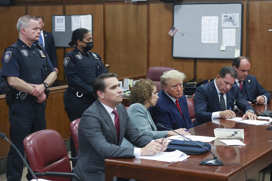 Former U.S. President Donald Trump appears in court for an arraignment on charges stemming from his indictment by a Manhattan grand jury following a probe into hush money paid to porn star Stormy Daniels, in New York City, U.S., April 4, 2023. REUTERS/Andrew Kelly/Pool Apr 4, 2023; New York, New York, USA; Former President Donald Trump appears in court for arraignment before Judge Juan Merchan following his surrender to New York authorities at the New York County Criminal Court. Trump appeared in court to answer charges from a grand jury investigation into payments made during the 2016 campaign to bury allegations of extramarital sexual encounters. (Andrew Kelly-Pool Photo via USA TODAY)