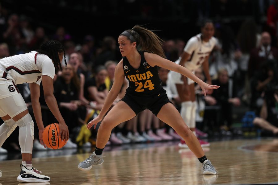 Iowa+guard+Gabbie+Marshall+eyes+the+ball+during+a+2023+NCAA+women%E2%80%99s+Final+Four+game+between+No.+1+South+Carolina+and+No.+2+Iowa+at+American+Airlines+Arena+in+Dallas%2C+Texas%2C+on+Friday%2C+March+31%2C+2023.+Marshall+completed+two+assists.+The+Hawkeyes+defeated+the+Gamecocks%2C+77-73%2C+to+advance+to+the+National+Championship+Game.+