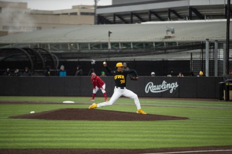 Iowa pitcher Marcus Morgan throws a pitch to home during a baseball game at Duane Banks Field in Iowa City on Saturday April 22, 2023. The Hawkeyes defeated the Corn Huskers, 8-0.