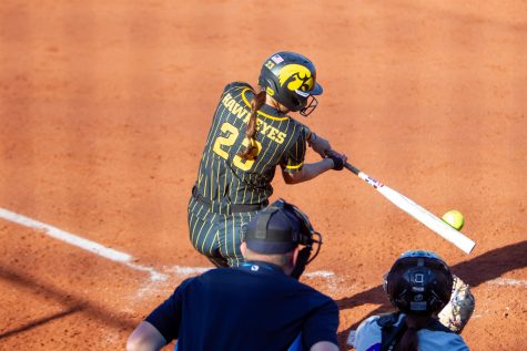 Iowa infielder Grace Banes hits the ball during a softball game between Iowa and Northern Iowa at Bob Pearl Softball Field on Wednesday, May 3, 2023. The Panthers defeated the Hawkeyes, 4-2.
