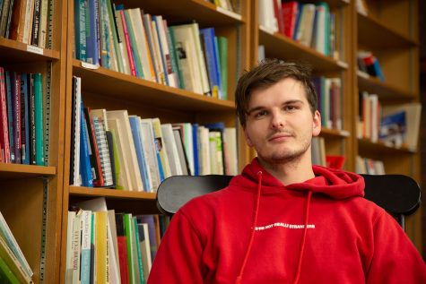 UI student Kyler Johnson poses for a portrait at the English-Philosophy Building in Iowa City on Monday, May 1, 2023. Johnson received a Fulbright English Teaching Assistantship Award and will teach English in Brazil during 2023-2024. 