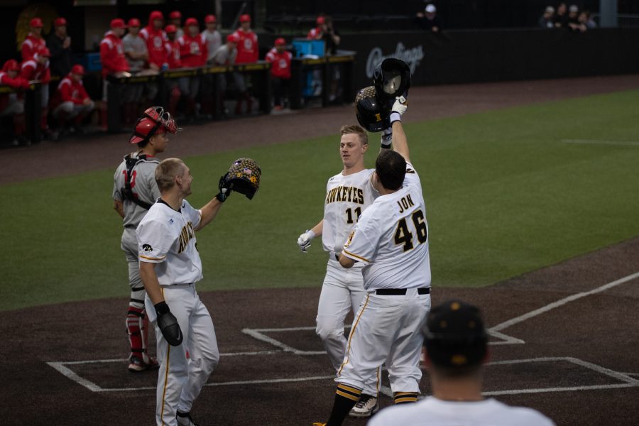 Iowa utility player Sam Peterson celebrating after hitting a home run during a baseball game between Iowa and Ohio State at Duane Banks Baseball Stadium on Friday, May 5, 2023. The Hawkeyes defeated the Buckeyes 16-9.