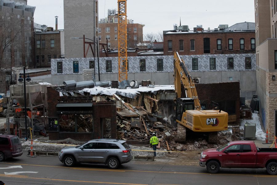 A bulldozer demolished The Mill on Jan. 27 2021. The Mill was known as an art and concert venue for Iowa City artists and musicians before closing in May 2020.
