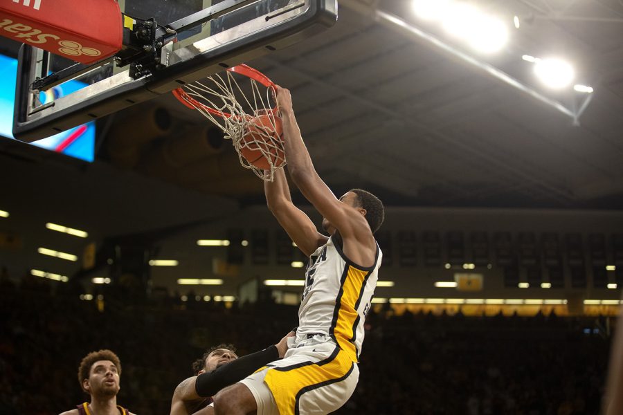 Iowa Sophomore Keegan Murray makes a dunk during a game between Iowa and Minnesota. Murray had 24 points total on night along with 13 defensive rebounds as The Iowa Hawkeyes beat the Minnesota Golden Gophers 71-59 on Sunday Feb. 6 2022 at Carver-Hawkeye Arena.