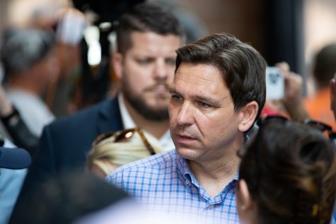 2024 Republican presidential candidate Ron DeSantis interacts with attendees during “Joni’s Roast and Ride” a Republican-hosted event in Des Moines, Iowa on Saturday, June 3, 2023. 