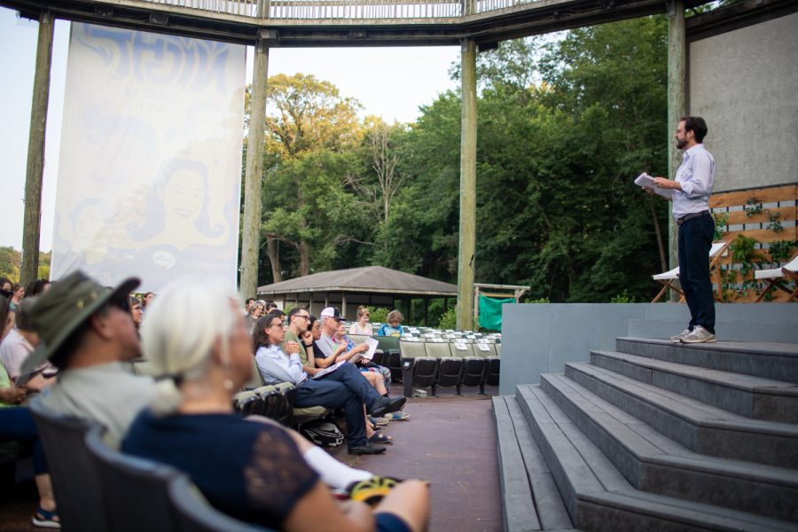 Adam Knight the Director of William Shakespeare’sTwelfth Night introduces attendees before the live performance of William Shakespeare’s Twelfth Night in Iowa City on Thursday, June 22, 2023. 