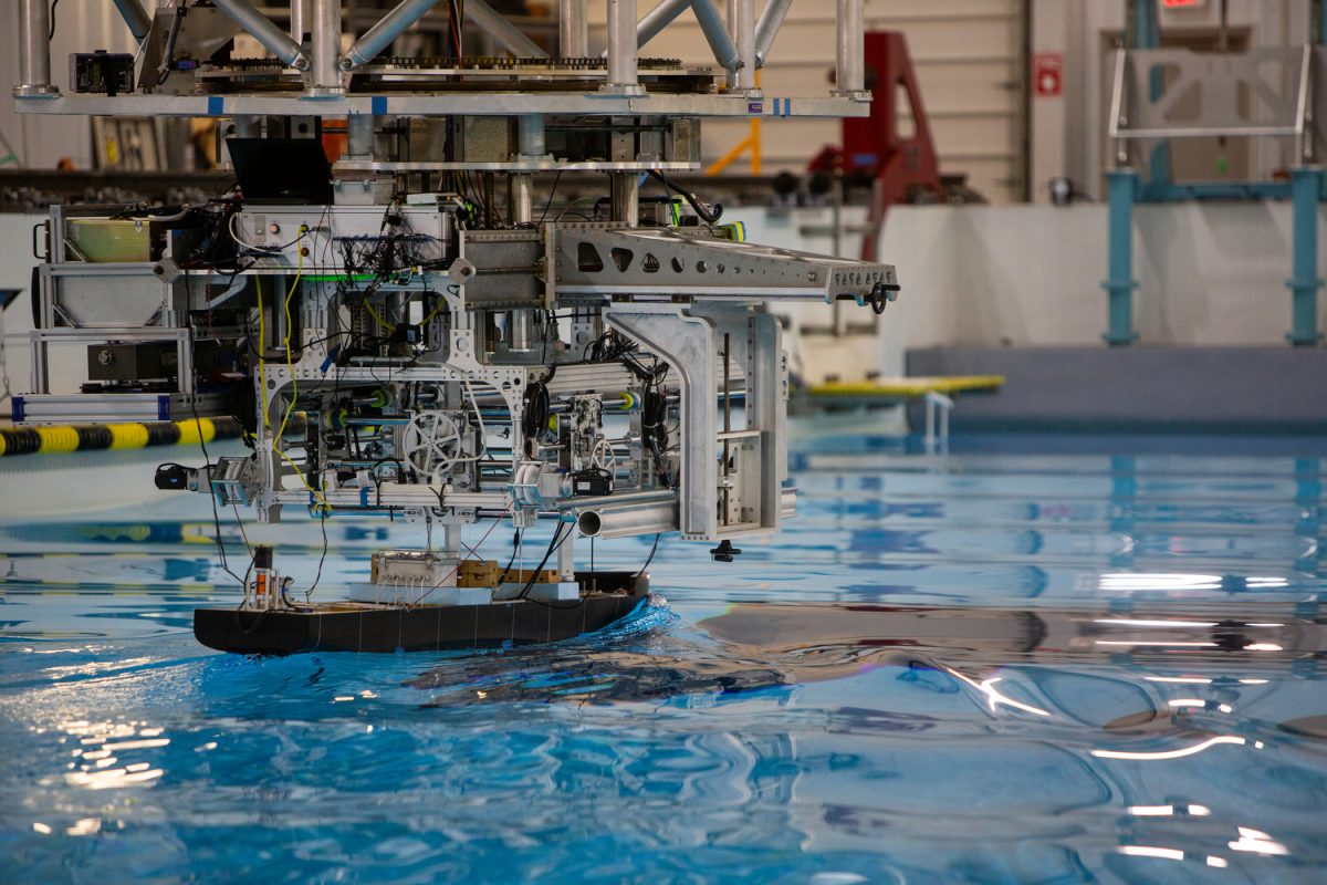 An experiment involving a test scale-model ship is shown during a IIHR — Hydroscience and Engineering Research Facility open house in Coralville, Iowa, on Friday, July 14, 2023. 