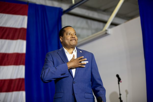 2024 presidential candidate Larry Elder places his hand on his chest during Ashley Hinson’s BBQ Bash at Hawkeye Downs in Cedar Rapids, Iowa on Sunday, August 6, 2023.