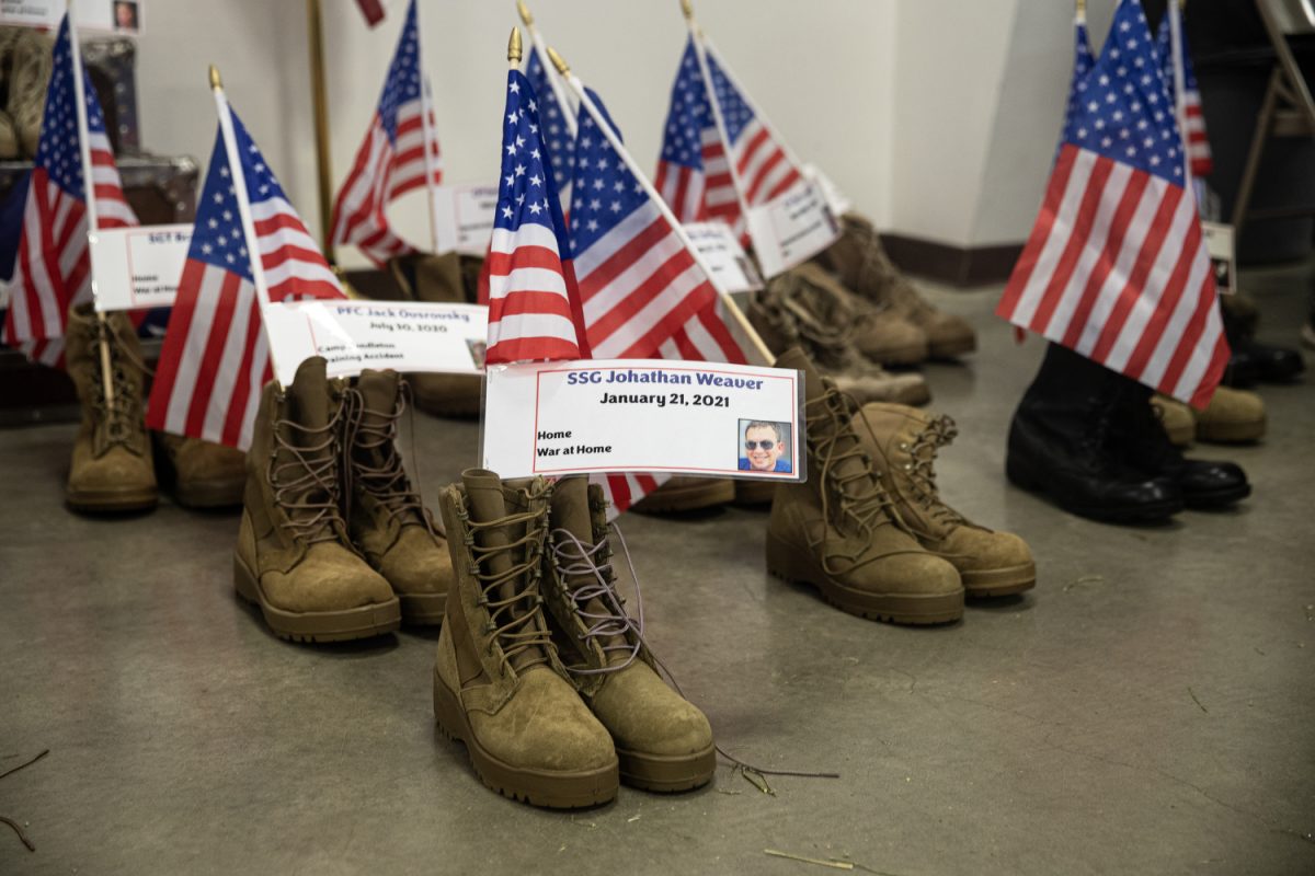 A display of boots for veterans are seen during Ashley Hinson’s BBQ Bash at Hawkeye Downs in Cedar Rapids, Iowa on Sunday, August 6, 2023.