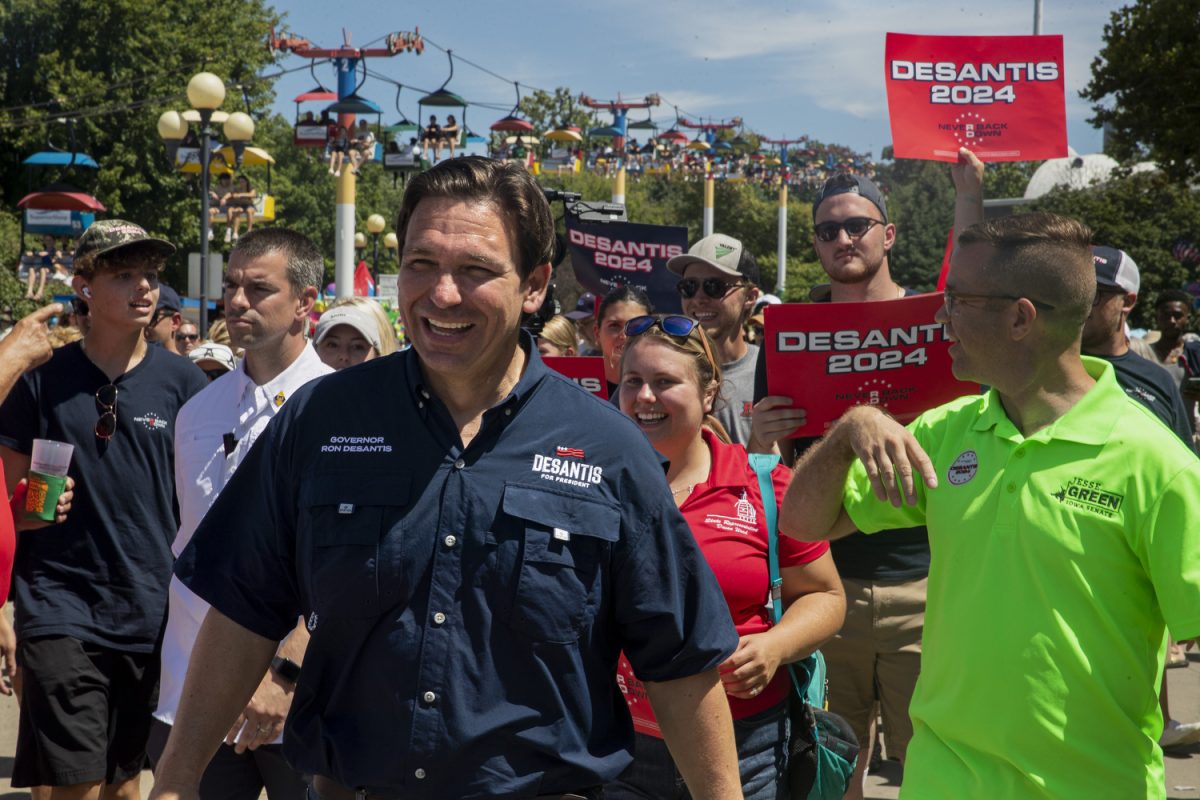 Republican+presidential+candidate+and+Florida+Gov.+Ron+DeSantis+walks+with+fairgoers+during+the+2023+Iowa+State+Fair+in+Des+Moines%2C+Iowa%2C+on+Saturday%2C+Aug.+12%2C+2023.