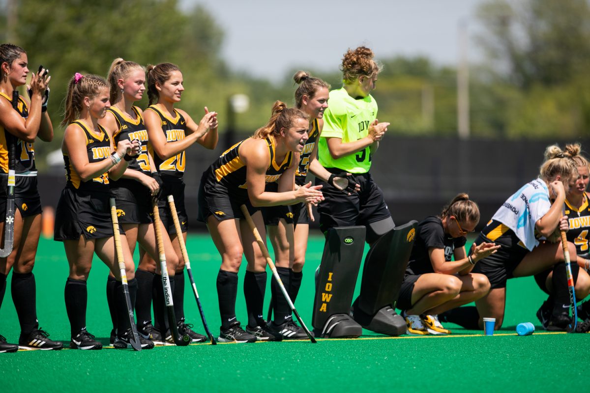 Iowa+players+cheer+for+a+teammate+at+an+exhibition+shootout+during+a+field+hockey+exhibition+match+between+Iowa+and+Northwestern+at+Grant+Field+in+Iowa+City+on+Saturday%2C+Aug.+19%2C+2023.+The+Hawkeyes+defeated+the+Wildcats%2C+3-1.