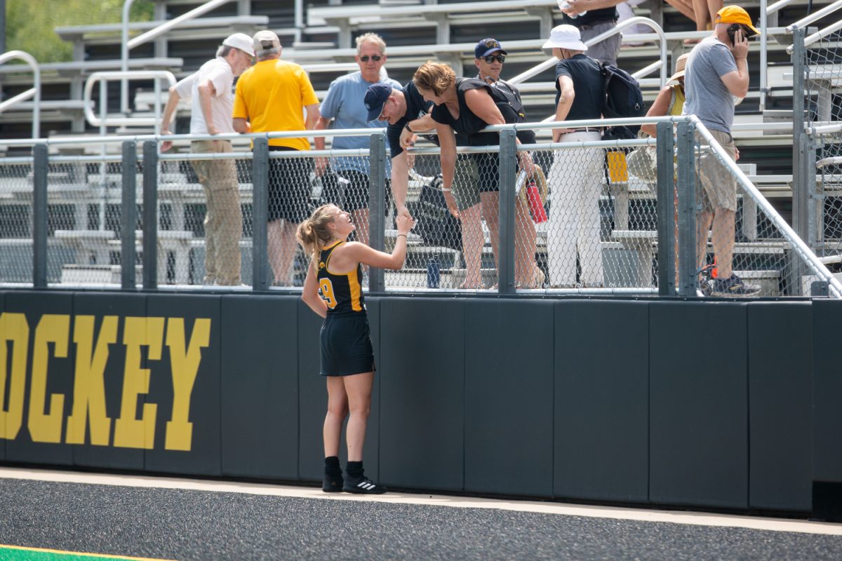 Iowa+midfielder+Sofie+Stribos+meets+with+supporters+after+a+field+hockey+exhibition+match+between+Iowa+and+Northwestern+at+Grant+Field+in+Iowa+City+on+Saturday%2C+Aug.+19%2C+2023.+The+Hawkeyes+defeated+the+Wildcats%2C+3-1%2C+at+their+first+home+game+of+the+season.