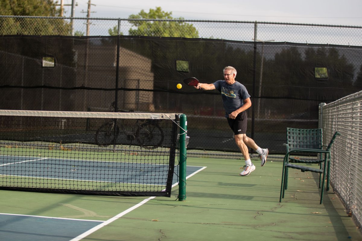 Iowa City community member David Ricci hits a ball at the Mercer Park pickleball courts in Iowa City on Friday, Aug. 25, 2023. Ricci is a member of Pickleball Johnson County, an organization that encourages adults in Iowa City, North Liberty, and Coralville to get involved in the up-and-coming sport.