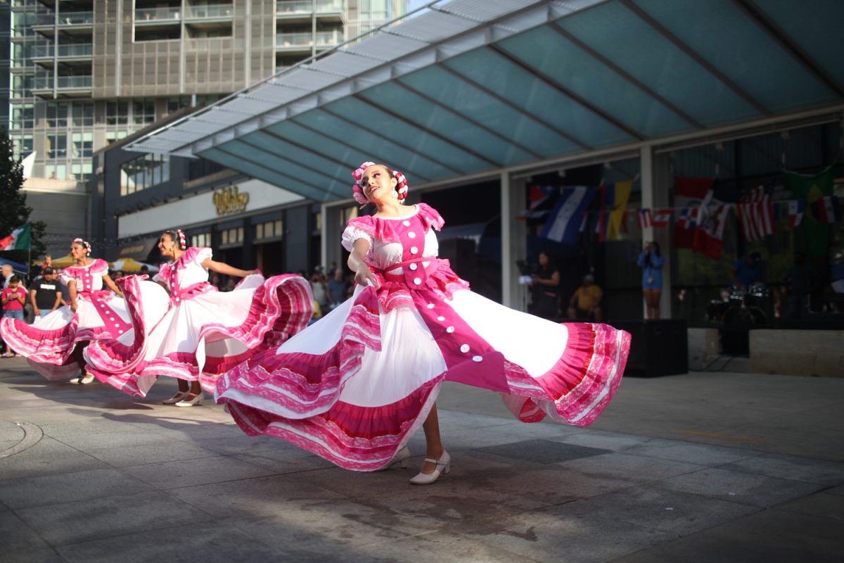 Performers from Ballet Folklorico Sones Mexicanos dance at the 2023 Iowa City Latino Fest in Downtown Iowa City on Aug. 26, 2023. 