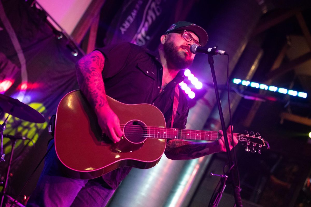 Folk singer Erick Willis opens for Joey Green at Wildwood Smokehouse and Saloon in Iowa City on Saturday, Aug. 27, 2023. Green is a county rock singer from Texas. He gained popularity after appearing on season 15 of NBCs The Voice. 