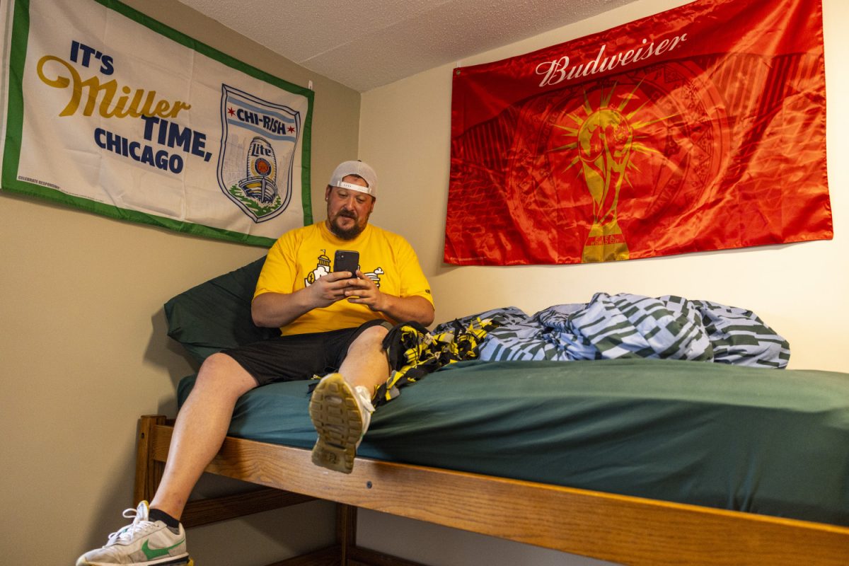 UI student Billy Stoynoff poses for a portrait in his dorm room in Reinow at the University of Iowa in Iowa City on Friday, Aug. 25, 2023. Stoynoff is a 33-year-old transfer student entering his third year in college. To document his experience adapting to Iowa City as a nontraditional student, he began making TikTok videos and has amassed over 6,000 followers in just about two weeks. Stoynoff said that he hasn’t thought about the future of his TikTok, but he has a plan for if he starts making money on his videos. “I’m TikTok illiterate basically, but if I ever did make money, my plan is to donate it to the Children’s Hospital,” Stoynoff said in an interview to DITV.