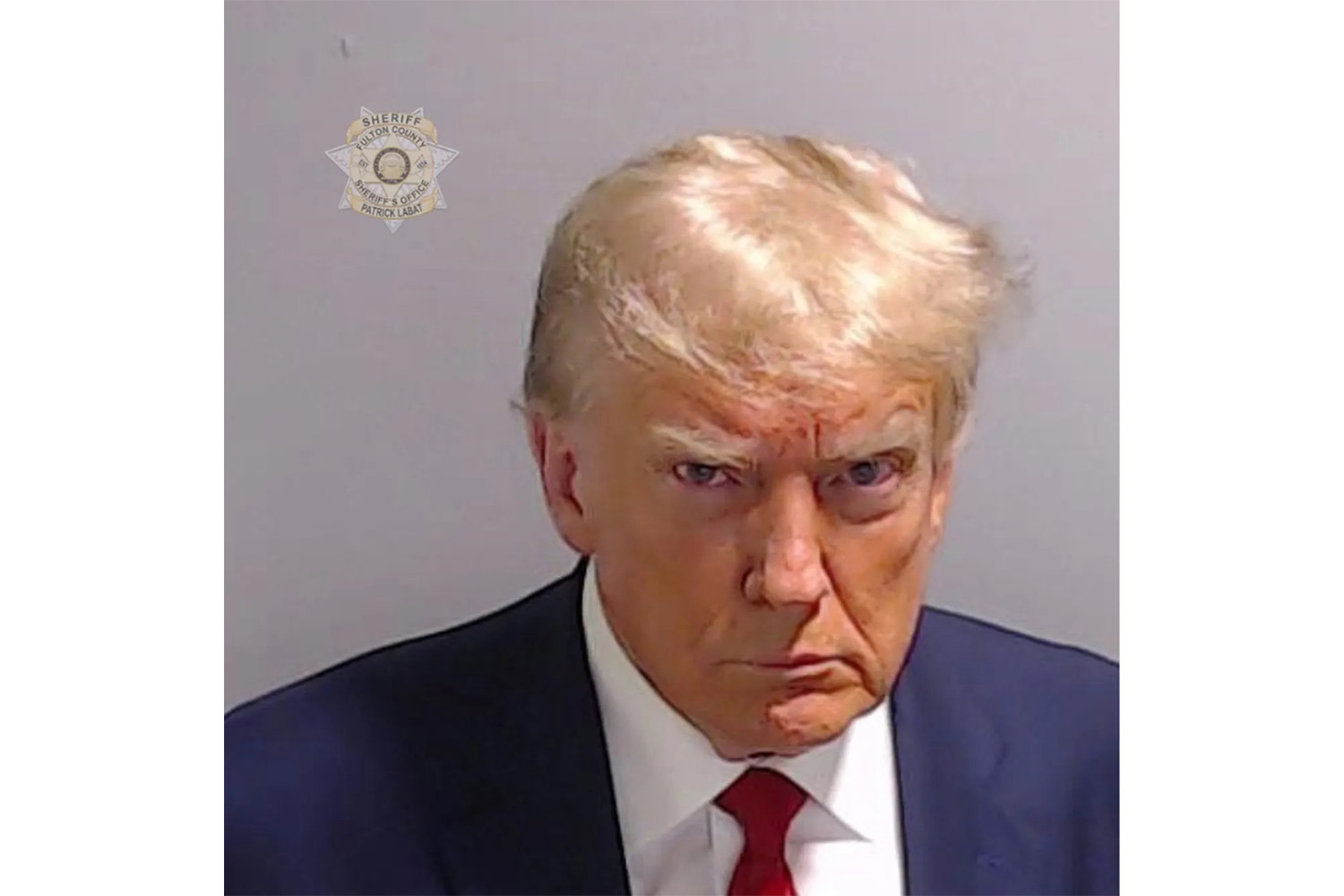 Aug 24, 2023; Atlanta, GA, USA; This handout booking photo provided by the Fulton County Sheriffs Office shows Donald Trump after he surrendered and was booked. Former President Donald Trump, and 18 others were indicted on 41 charges related to their efforts to overturn the 2020 US Presidential election.