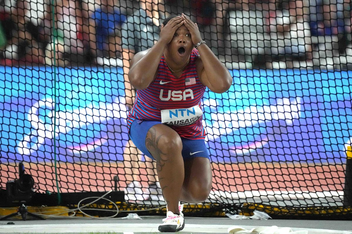 Aug 22, 2023; Budapest, Hungary; Laulauga Tausaga (USA) celebrates after winning the womens discus with a throw of 228-0 (69.49m) on her fifth attempt during the World Athletics Championships Budapest 23 at National Athletics Centre. Mandatory Credit: Kirby Lee-USA TODAY Sports