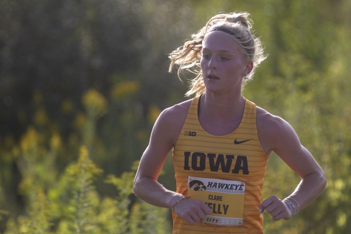 Freshman Clare Kelly runs during the Hawkeye Invite at Ashton Cross-Country Course in Iowa City on Friday Sept. 1 2023.