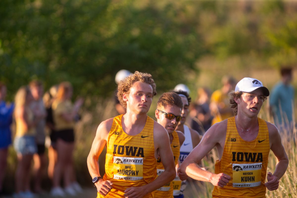 Junior Max Murphy closes in on the lead during the Hawkeye Invitational at Ashton Cross-Country Course in Iowa City on Friday, Sept. 1, 2023. Murphy broke the University of Iowa mens 6,000-meter record at the invite. The Iowa mens team won the invite with the women coming in second.