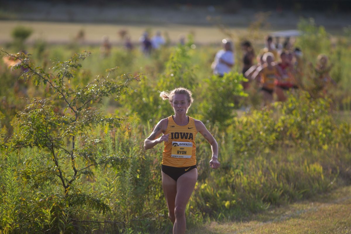 Senior Abby Ryon competes during the Hawkeye invite at Ashton Cross-Country Course in Iowa City, on Friday, Sept. 1, 2023. The Iowa mens team won the invite with the women coming in second.