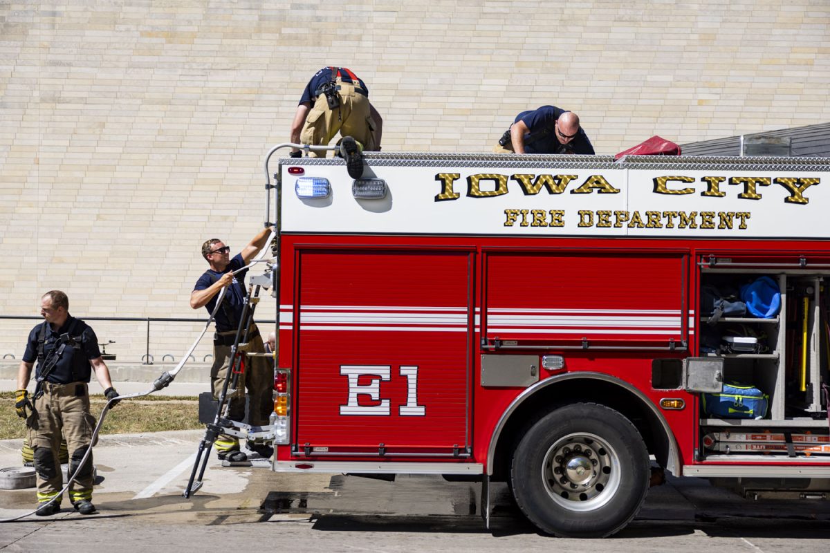 Iowa+City+firefighters+load+a+hose+into+a+truck+during+a+fire+at+the+Advanced+Technology+Lab+on+the+University+of+Iowa+campus+in+Iowa+City+on+Friday%2C+Sept.+1%2C+2023.+The+first+Hawk+Alert+went+out+at+10%3A54+a.m.%2C+urging+people+to+avoid+the+area.+At+11%3A28+p.m.%2C+a+second+Hawk+Alert+told+people+to+resume+normal+activity%2C+as+the+situation+was+%E2%80%9Cstable.%E2%80%9D+This+was+the+second+day+in+a+row+that+a+fire+was+reported+at+the+Advanced+Technology+Lab.