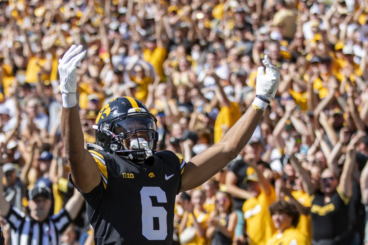 Iowa wide receiver Seth Anderson celebrates after scoring a touchdown during a football game between No. 25 Iowa and Utah State at Kinnick Stadium on Saturday, Sept. 2, 2023. The Hawkeyes defeated the Aggies, 24-14.