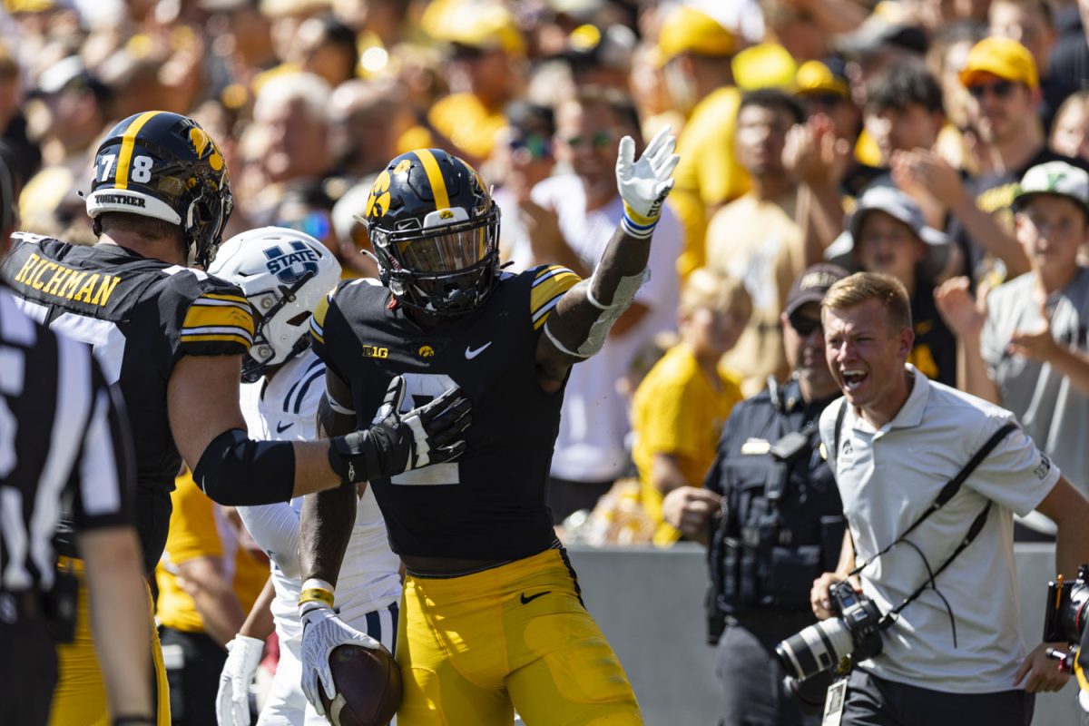 Iowa running back Kaleb Johnson celebrates after a run during a football game between No. 25 Iowa and Utah State at Kinnick Stadium on Saturday, Sept. 2, 2023. The Hawkeyes defeated the Aggies, 24-14.
