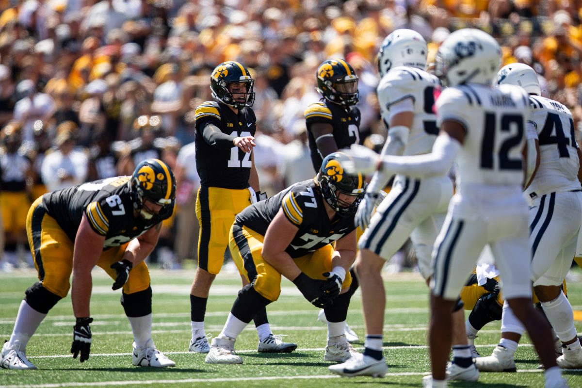 Iowa quarterback Cade McNamara gives directions before the snap during a football game between No. 25 Iowa and Utah State at Kinnick Stadium, on Saturday, Sept. 2, 2023. The Hawkeyes defeated the Aggies, 24-14.