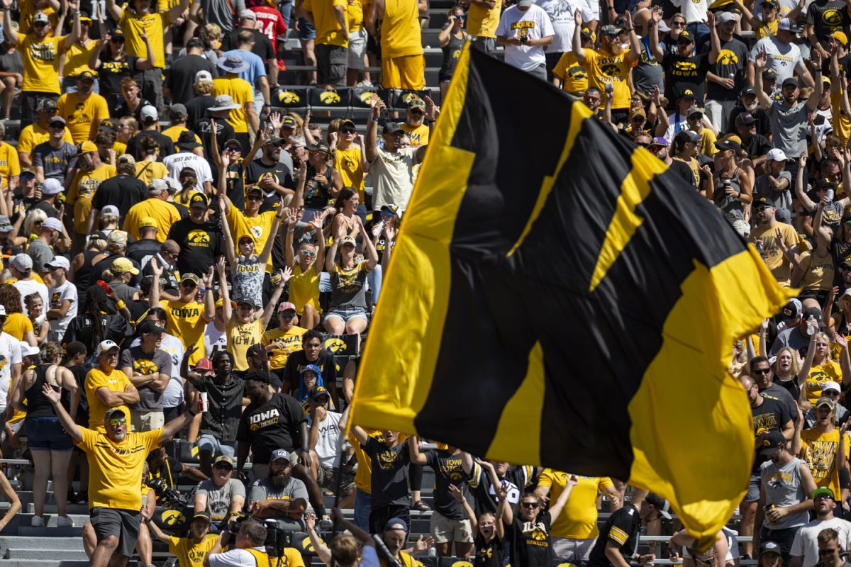 Fans cheer during a football game between No. 25 Iowa and Utah State at Kinnick Stadium on Saturday, Sept. 2, 2023. The Hawkeyes defeated the Aggies, 24-14.