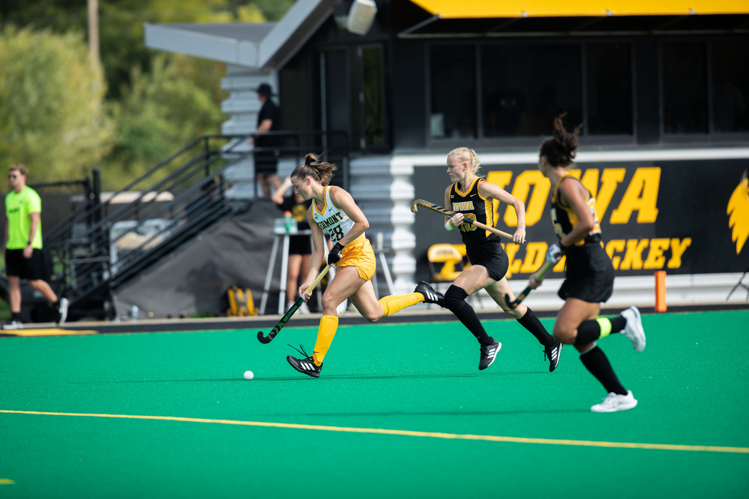 Vermont forward Alina Gerke (28) races with the ball down the field while Iowa midfielder Dionne van Aalsum chases her during the game against the Iowa Hawkeyes at Grant Field in Iowa City on Sept. 15, 2023. The Hawkeyes defeated the Catamounts 5-0.