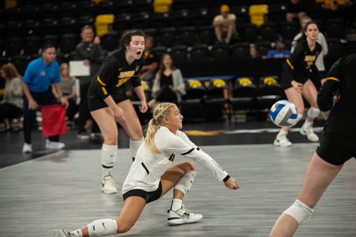 Iowa’s Sydney Dennis digs the ball to continue the set during a volleyball game between Iowa and Central Michigan at Xtreme Arena in Coralville on Friday, Sept. 8, 2023. The Hawkeyes defeated the Chippewas, 3-1.