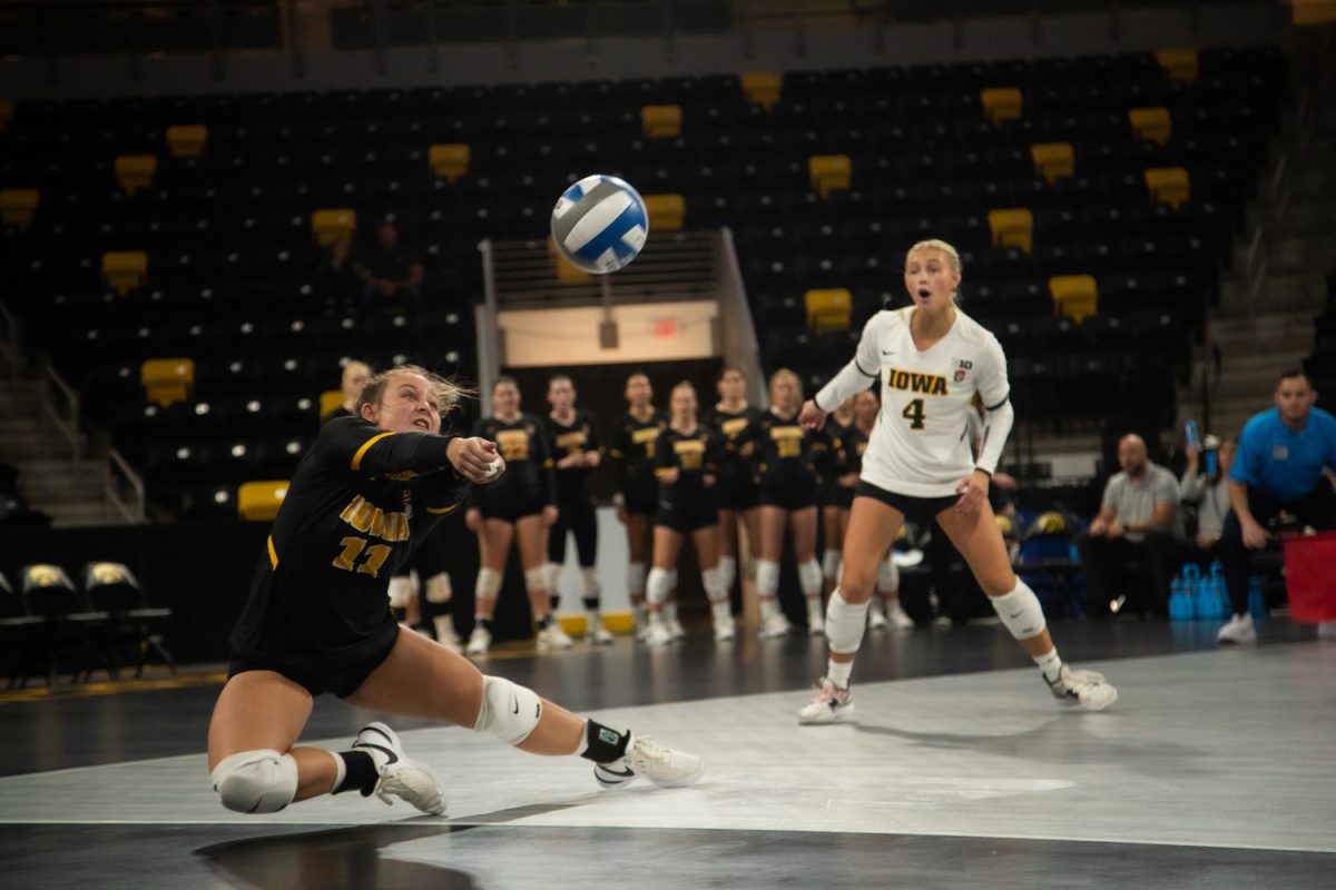 Iowa’s Amanda Darling dives to keep the ball in play during a volleyball game between Iowa and Central Michigan at Xtreme Arena in Coralville on Friday, Sept. 8, 2023. The Hawkeyes defeated the Chippewas, 3-1.