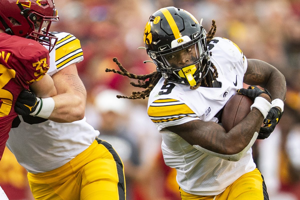 Iowa running back Jaziun Patterson carries the ball during a Cy-Hawk football game between Iowa and Iowa State at Jack Trice Stadium in Ames on Saturday, Sept. 9, 2023. The Hawkeyes defeated the Cyclones, 20-13. Patterson rushed for 86 yards.