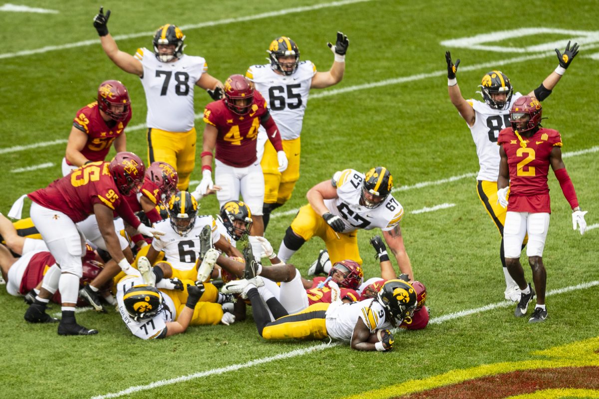 Iowa running back Jaziun Patterson carries the ball into the end zone for a touchdown during a Cy-Hawk football game between Iowa and Iowa State at Jack Trice Stadium in Ames on Saturday, Sept. 9, 2023. The Hawkeyes defeated the Cyclones, 20-13. Patterson had one touch down on the day.