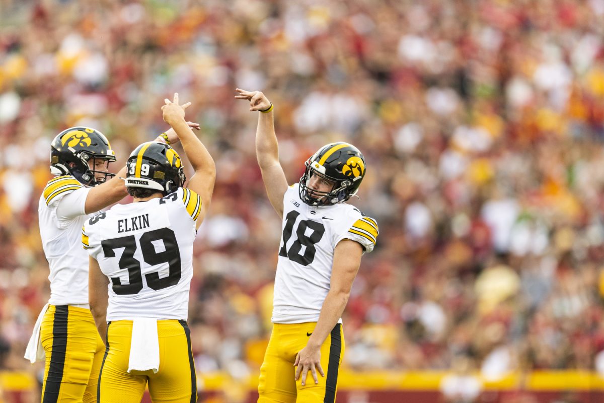 Iowa+punter+Tory+Taylor%2C+long+snapper+Luke+Elkin%2C+and+kicker+Drew+Stevens+celebrate+a+field+goal+during+a+Cy-Hawk+football+game+between+Iowa+and+Iowa+State+at+Jack+Trice+Stadium+in+Ames+on+Saturday%2C+Sept.+9%2C+2023.+The+Hawkeyes+defeated+the+Cyclones%2C+20-13.