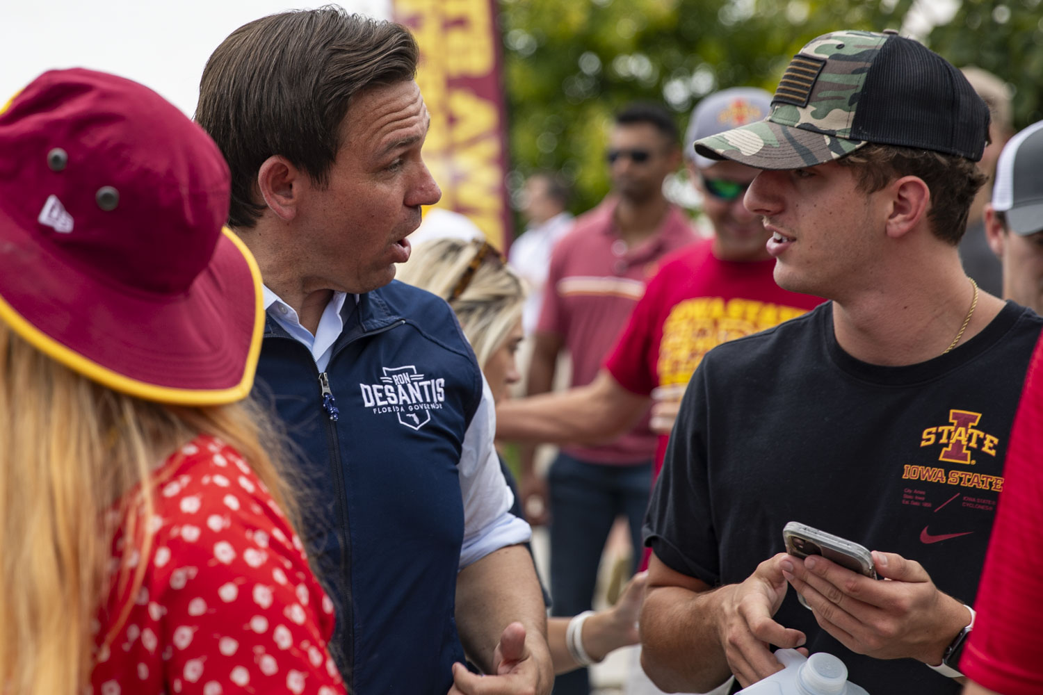 Republican presidential candidate and Florida Gov. Ron DeSantis speaks with a supporter before a Cy-Hawk football game between Iowa and Iowa State at Jack Trice Stadium in Ames on Saturday, Sept. 9, 2023. (Ayrton Breckenridge/The Daily Iowan)