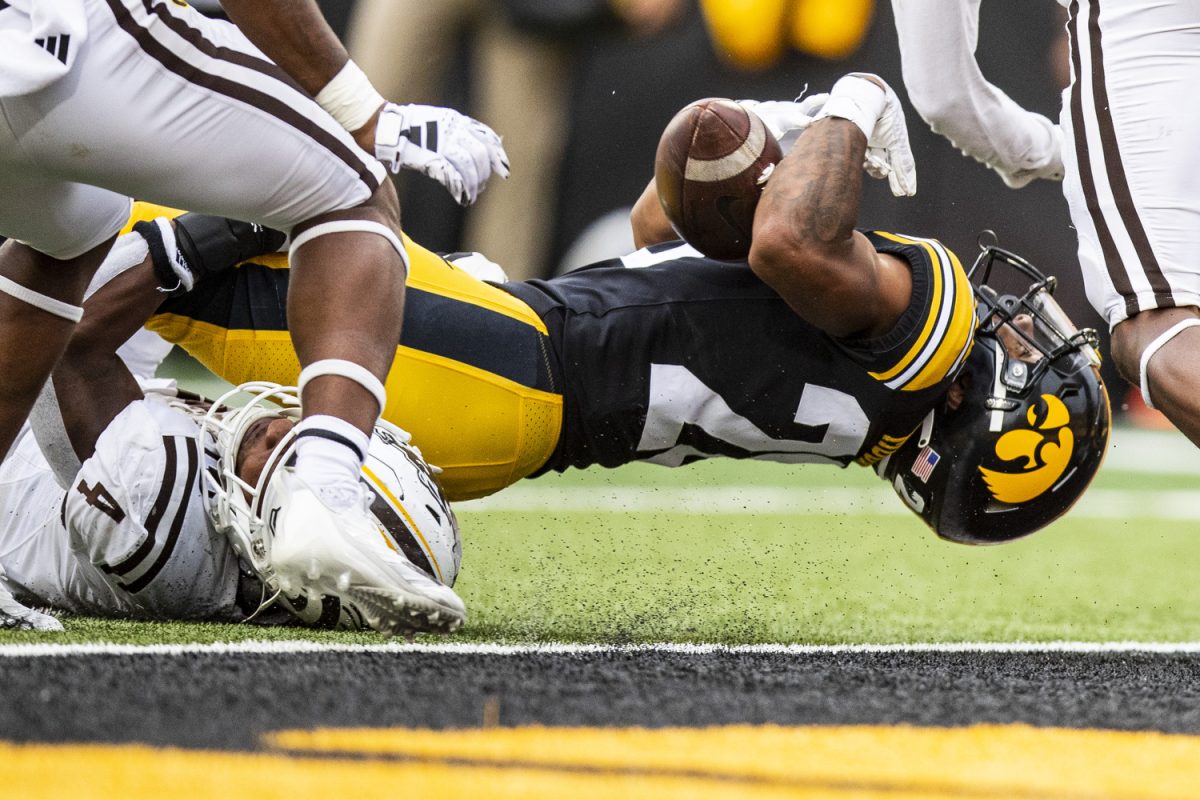 Iowa running back Kamari Moulton dives into the end zone for a touchdown during a football game between Iowa and Western Michigan at Kinnick Stadium in Iowa City on Saturday, Sept. 16, 2023. The Hawkeyes defeated the Broncos, 41-10. (Grace Smith/The Daily Iowan)
